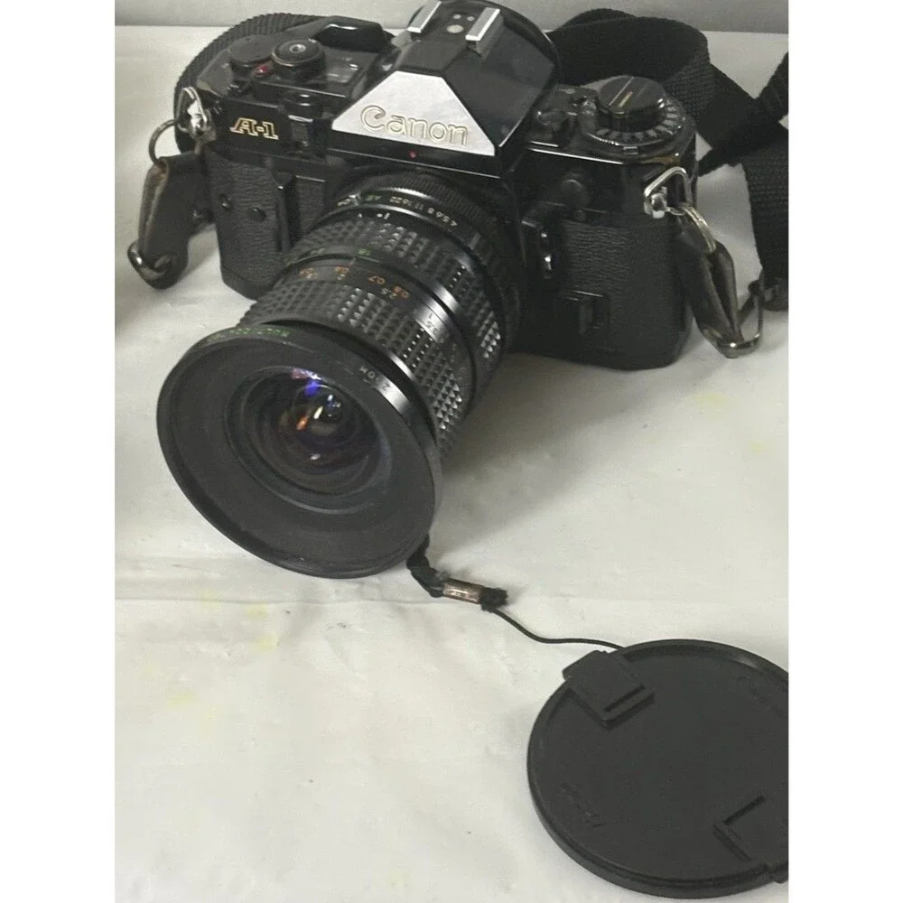 Canon A-1 35mm Film Camera with toyo optics 28mm 1:3.5 Lens and F=28-80  Tested